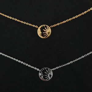 <transcy>Sun and moon symbol necklace made of STAINLESS STEEL</transcy>